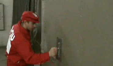 Baumit - natrysk kleju do dociepleń