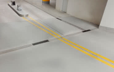 Nowoczesny system odwodnień posadzek w garażach podziemnych, wielopoziomowych