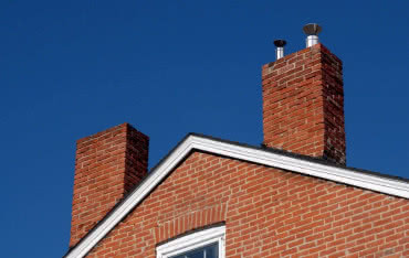 Jak uniknąć błędów przy budowie komina?