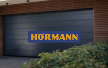 Nowoczesne bramy garażowe: połączenie designu, bezpieczeństwa i komfortu