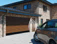 Bramy garażowe rolowane i podsufitowe: poradnik wyboru i montażu