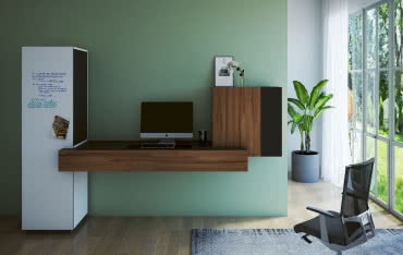 Pracujesz w domu? Zobacz, jak można urządzić biuro w pokoju dziennym  