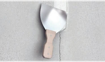 Gładkie ściany. Co powinniśmy wiedzieć o masach szpachlowych?