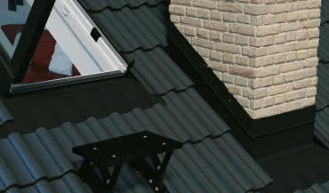 Zabezpieczenie komina przed deszczem i wiatrem