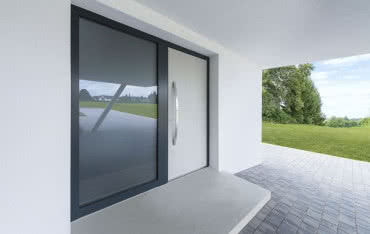 Minimalizm w architekturze domu a drzwi zewnętrzne