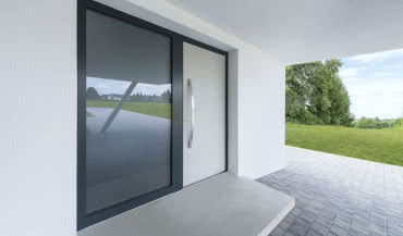 Minimalizm w architekturze domu a drzwi zewnętrzne