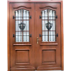 Drzwi zewnętrzne stylizowane z kratą