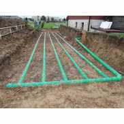 Gruntowy wymiennik ciepła GLOBAL na zewnątrz domu jednorodzinnego